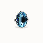 Large ring with blue oval faceted crystal